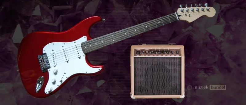 Je eerste gitaarles plannen - Begin jouw muzikale reis op Muziekbundel.nl Een elektrische gitaar met versterker, klaar voor je eerste gitaarles via Muziekbundel.nl.